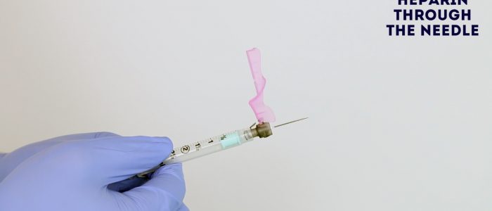 Flush heparin through the needle