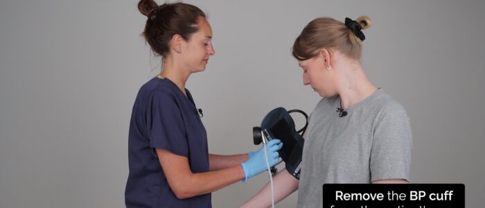 Lying and standing blood pressure: Remove the blood pressure cuff from the patient